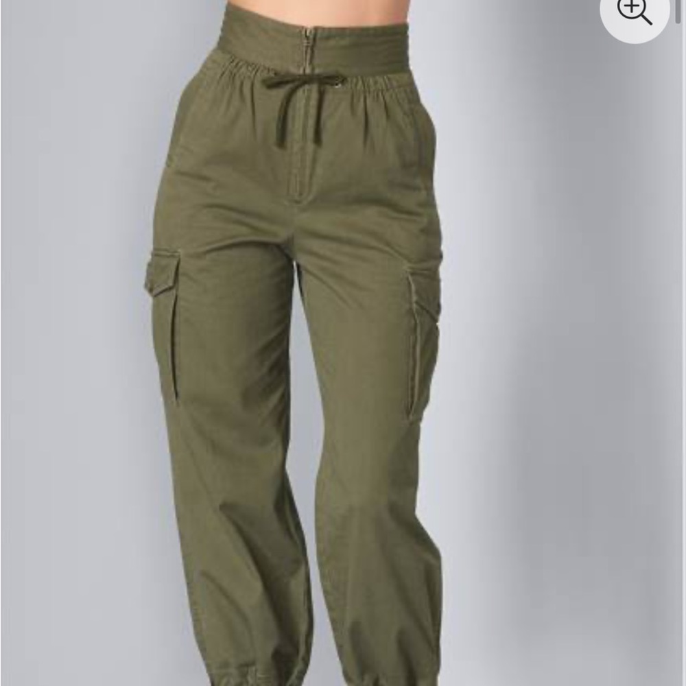 High waisted cargo pants with tie bottoms around the ankle